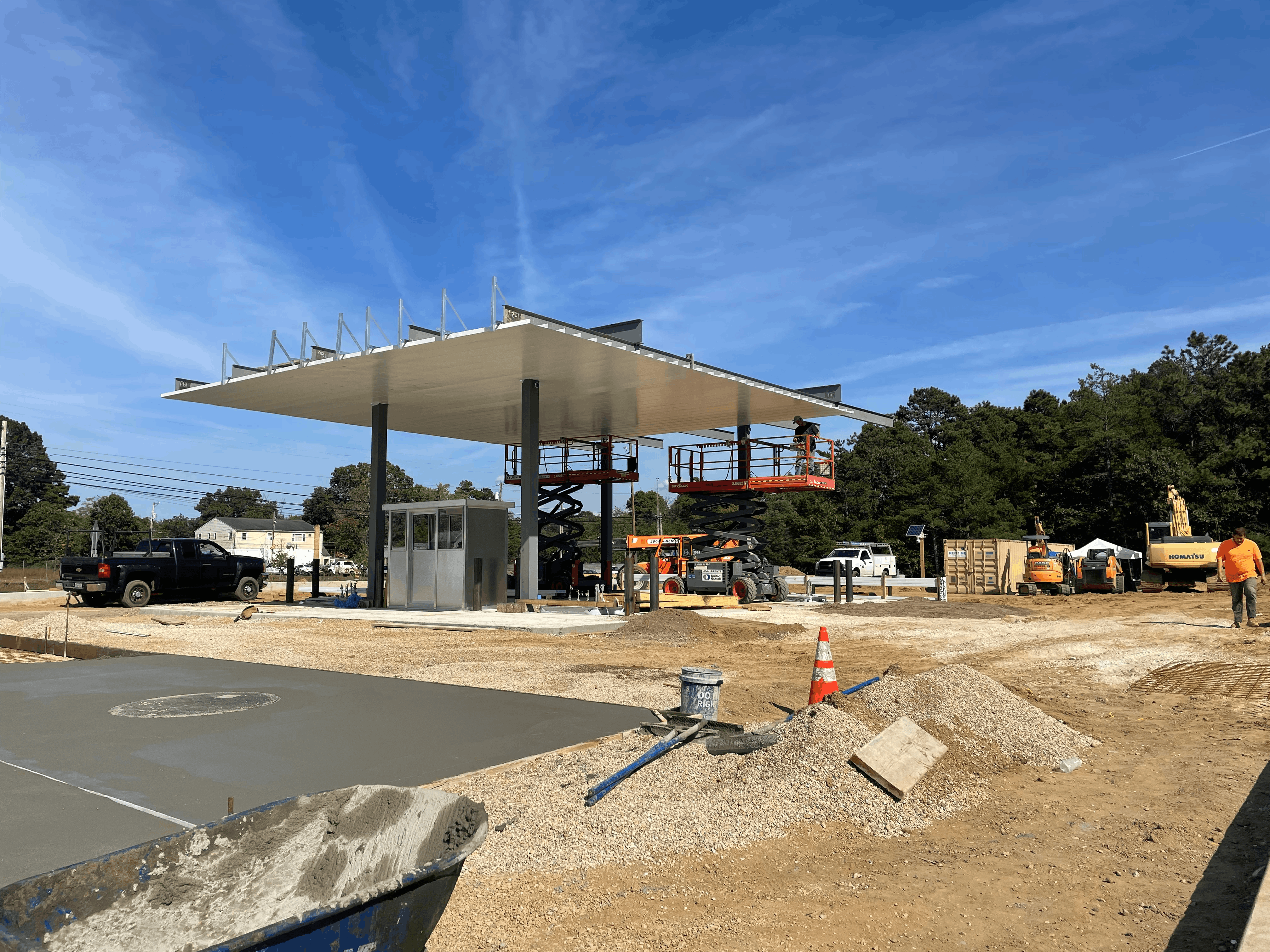 Commercial building construction with fuel station infrastructure